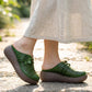Mules compensées ajourées à motif floral vintage