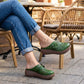 Mules compensées ajourées à motif floral vintage