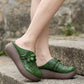 Mules compensées ajourées à motif floral vintage