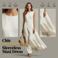 Robe longue chic, asymétrique et sans manches