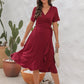 Robe avec col en V et taille haute