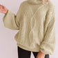 Pull en maille jacquard à col roulé